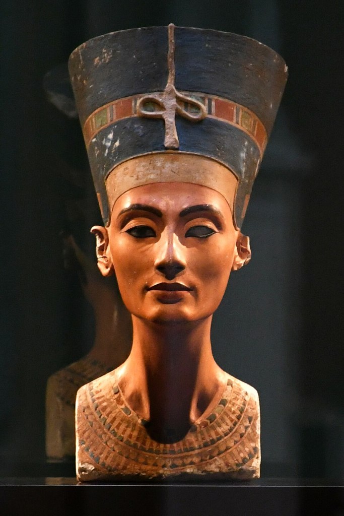 The Bust of Nefertiti, which used Orpiment pigment for its yellow tones.