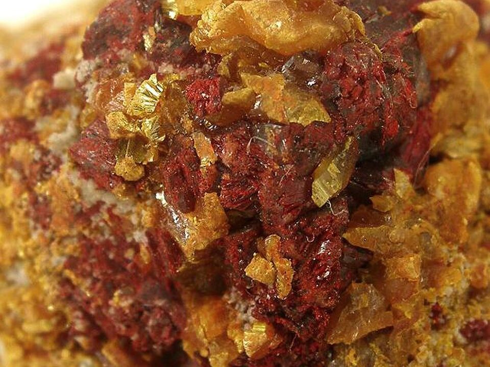 Rare red Lorándite mineral containing thallium and arsenic.