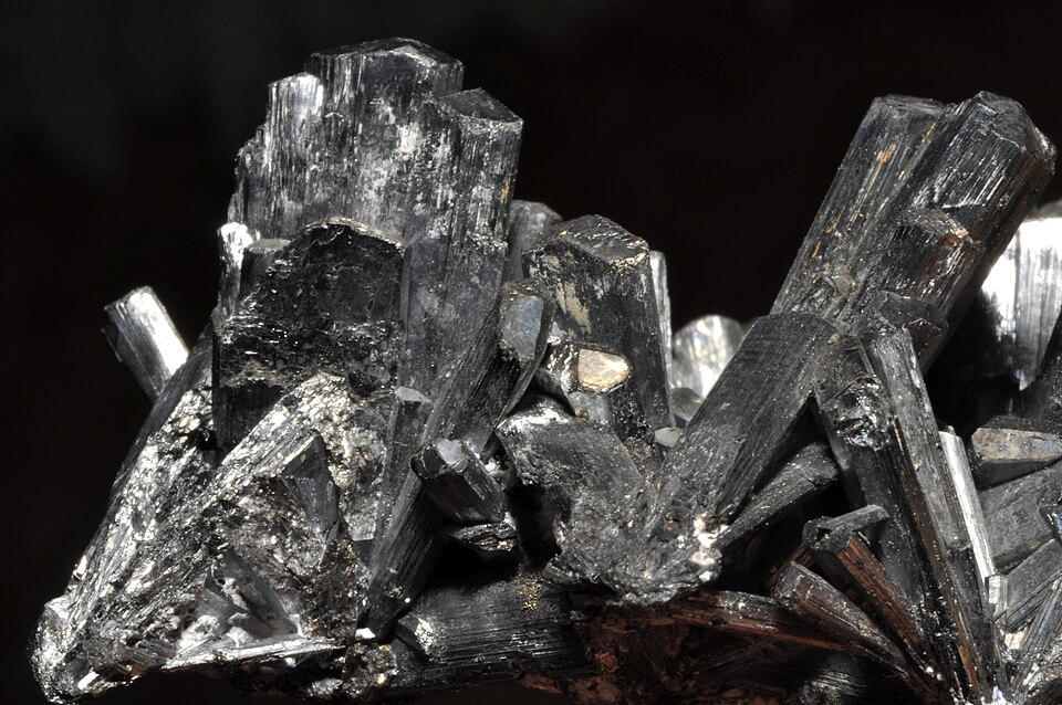 Metallic grey needle-like Stibnite crystals.