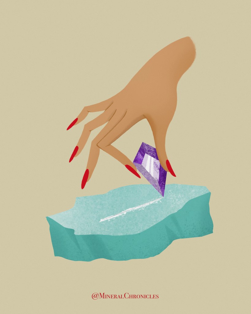Hand holding crystal demonstrating the Mohs hardness scratch test on a mineral surface